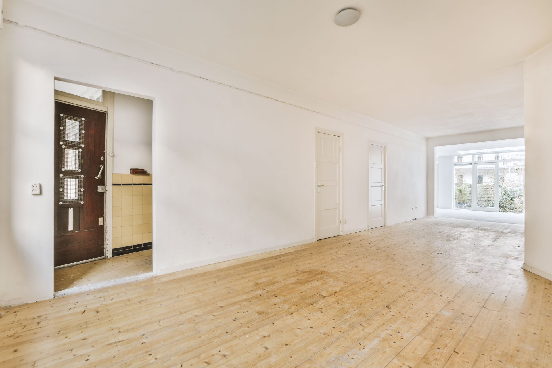 Empty room with wooden floors